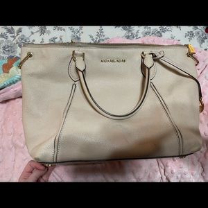 Medium size pink Michael Kors purse
